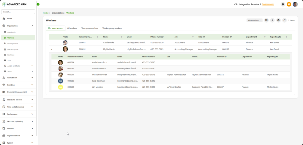 Screenshot of the Advanced HRM system showing the ‘Workers’ overview in an organization module. A table lists employees with details such as name, email, phone number, job title, department, and reporting manager. The interface includes a navigation menu on the left with HR functions like recruitment, payroll, and performance.